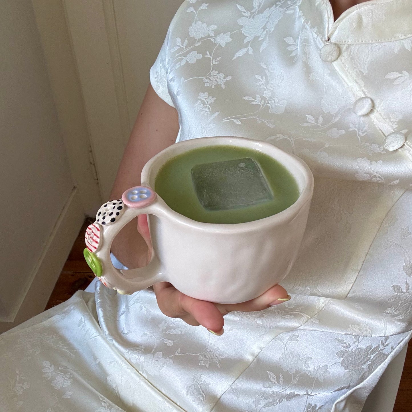 BUTTONS MUG
